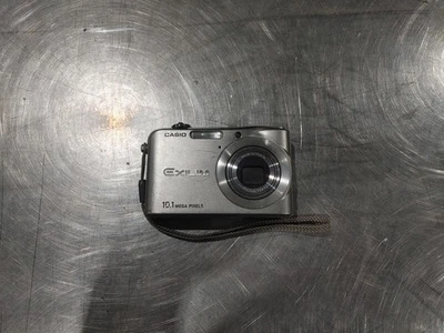 Casio Exilim EX-Z1000 10 Mega Pixels Camera Silver Untested - Fair - Image 1 of 4