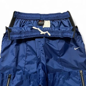 Pantalones deportivos Nike de colección para jóvenes XL azules de nailon con cremallera paracaídas Swoosh pantalones deportivos años 90 - Imagen 1 de 5