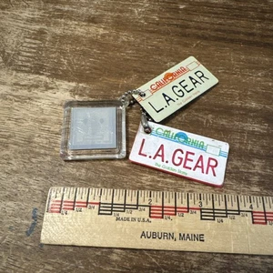 Vintage 3 Keychains LA Gear California Holographic & License Plate Keychains - Picture 1 of 15