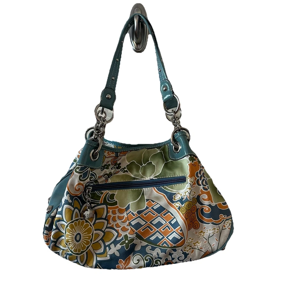 Bolso de Mano Kathy Van Zeeland Azul Floral Asas Tachonadas Adorno Cremalleras a Presión Foto 1 de 4