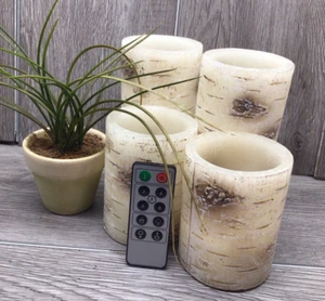 Velas de pilar sin llama de cera de abedul con temporizador remoto 4 piezas LED bosque encantado - Imagen 1 de 9
