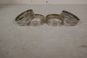 Juego de 4 servilletas redondas vintage de filigrana tono plateado - Imagen 1 de 5