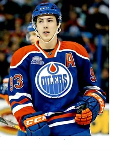 EDMONTON OILERS RYAN NUGENT HOPKINS SIGNIERTES BLAUES TRIKOT 8 X 10 - Bild 1 von 1