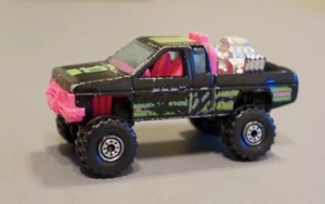 Hot Wheels NISSAN HARDBODY 4x4 1987 Truck Black & Pink  - Picture 1 of 5