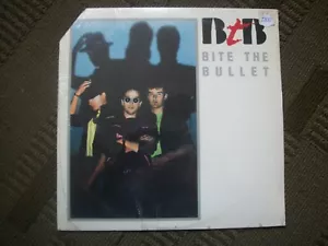 BITE THE BULLET--SAME TITLE---SEALED VINYL ALBUM. - Foto 1 di 2