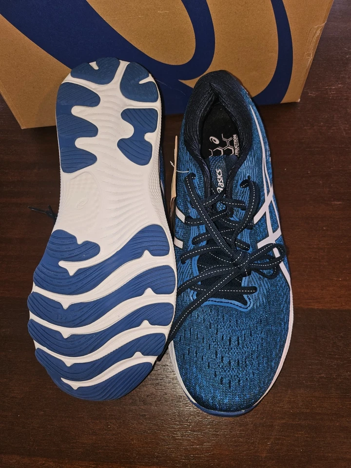 Zapatos para correr ASICS® 9 B GEL-NIMBUS 24 para mujer en azul francés/apenas rosa Foto 1 de 4