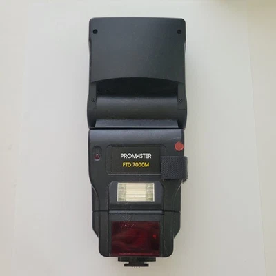 Promaster FTD 7000M Shoe Mount Flash For Canon Rebel Elan EOS FILM cameras - Image 1 of 4