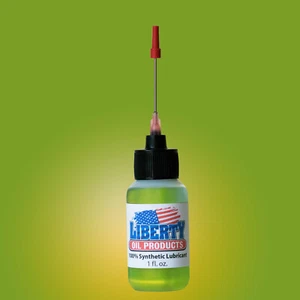 Carrete de pesca de agua dulce 100% aceite sintético con aplicador de acero inoxidable - Imagen 1 de 3