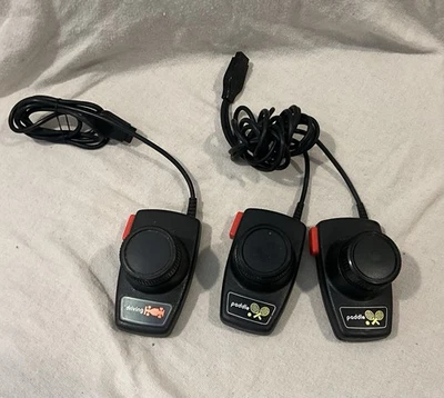Atari 2600 Paddle & Driving Controllers Lot Untested - Image 1 of 4
