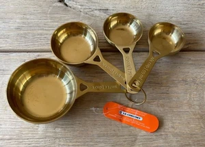 Le Creuset Stainless Steel Gold 4 Piece Measuring Cup Set NEW NWT - Picture 1 of 6