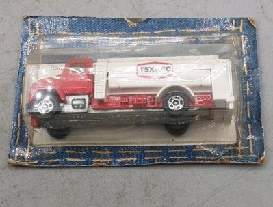 Camión de gasolina Tomy Pocket Car Texaco 1981 no. 234-F62, como nuevo en paquete (tarjeta cortada) Foto 1 de 2