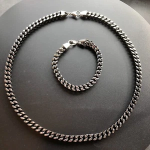 Juego de collar y pulsera de acero inoxidable con eslabones de bordillo combinación negro y plata - Imagen 1 de 9