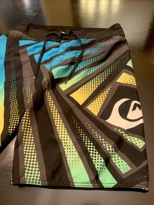 Vintage Quicksilver Board Shorts 34 Black with Color Block Surfer Jeremy Flores - Picture 1 of 9