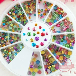 Venta al por mayor 12 Mezclas de colores metálicos forma redonda pernos de uñas diseño 3D rueda de manicura - Imagen 1 de 4