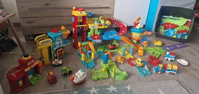 Grosse Tutut Flitzer Bahn Parkhaus Waschanlage Polizei Feuerwehr Flughafen Set - Bild 1 von 4