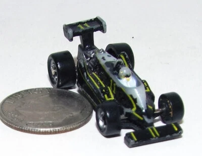 Very Small Micro Machine Plastic 1980's Indy style Race Car in Black # 11 - Image 1 of 4