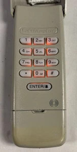377LM OEM Liftmaster Garage Door Wireless Entry Keypad Purple Learn Button - Picture 1 of 5