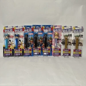 PEZ Spender & Süßigkeiten gemischt 8 Stück - Mickey, Marvel, Hello Kitty & Star Wars - Bild 1 von 3
