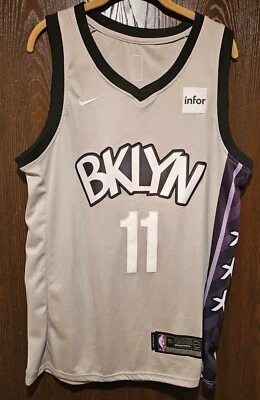 Camiseta deportiva de baloncesto Nike gris Kyrie Irving Brooklyn Nets Swingman hombre 50 COSIDAS Foto 1 de 2