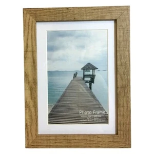 Cornice portafoto in carta effetto legno con rivestimento in plastica per foto 4" x 6" o 5" x 7" - Foto 1 di 7