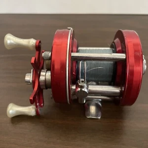 Vintage Abu Garcia Red Ambassadeur 5000 Baitcasting Fishing Reel Made in Sweden - Picture 1 of 7