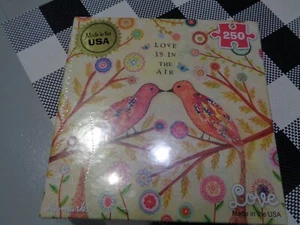 New 250 Piece Re-Marks Puzzle; "Love is in the Air" - Picture 1 of 3