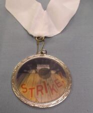 STRIKE hologram Bowling medal  2 1/4" diameter wide white neck ribbon