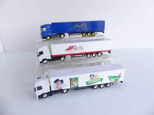 1:87 / 3 CAMIONS + REMORQUES PERSONNALISES QUIL / STOEFFLER / LINDT - Foto 1 di 4