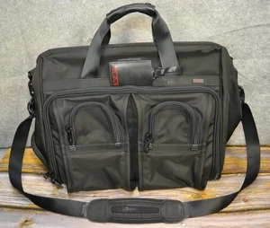 Tumi schwarze Aktentasche ballistisch Nylon Reise Laptop Schultertasche erweiterbar - Bild 1 von 24