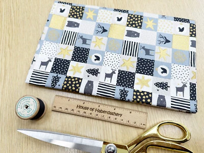 FABRIC REMNANT - Christmas Black Grey Gold Star Check Cotton Fabric - 1m Length - Image 1 of 4