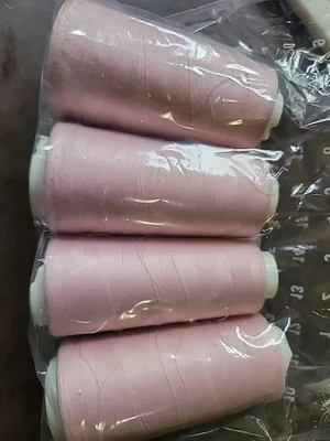 Unbranded  Overlock Thread Cones • Color: Pink. Lot Of 4. - Image 1 of 2