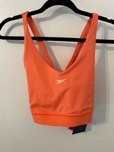 NWT Reebok Women's Large Team Bralette w/ Crossover Back Coral Sports Bra - Afbeelding 1 van 13