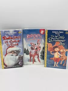 Christmas Movies On VHS - Rudolph, Santa Claus Comes To Town, Little Drummer Boy - Foto 1 di 3