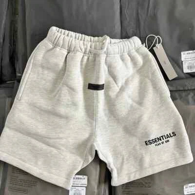 NWT FEAR OF GOD ESSENTIALS SHORTS FW22 "LIGHT OATMEAL" AUTHENTIC (SIZE XXS-XXL) - Image 1 of 4