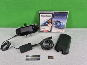 Sony Playstation Portable schwarz / PSP + 2GB + Ridge Racer 1 + 2 + Ladege. !! - Bild 1 von 9