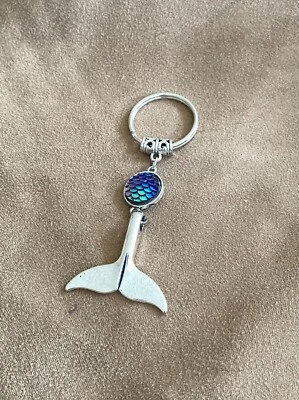 Llavero cola de sirena disco azul tono plata C45-25 Foto 1 de 2