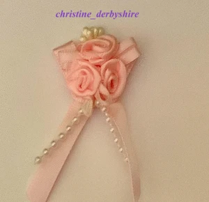 BONITO IMÁN DE PERLAS ROSADAS/ACCESORIO MAGNÉTICO ARCO DE PELO RENACIDO/FALSO/BEBÉ - Imagen 1 de 1
