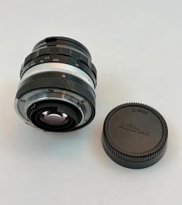 Nikkor-NC Nikon auto 1:2.8 24mm Camera Lens with Nikon filter - Image 1 of 4