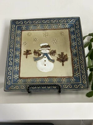 St Nicholas Square 9" Soneware Dinner Plate Snowman Blue Tan Tree Snowflakes - Image 1 of 4