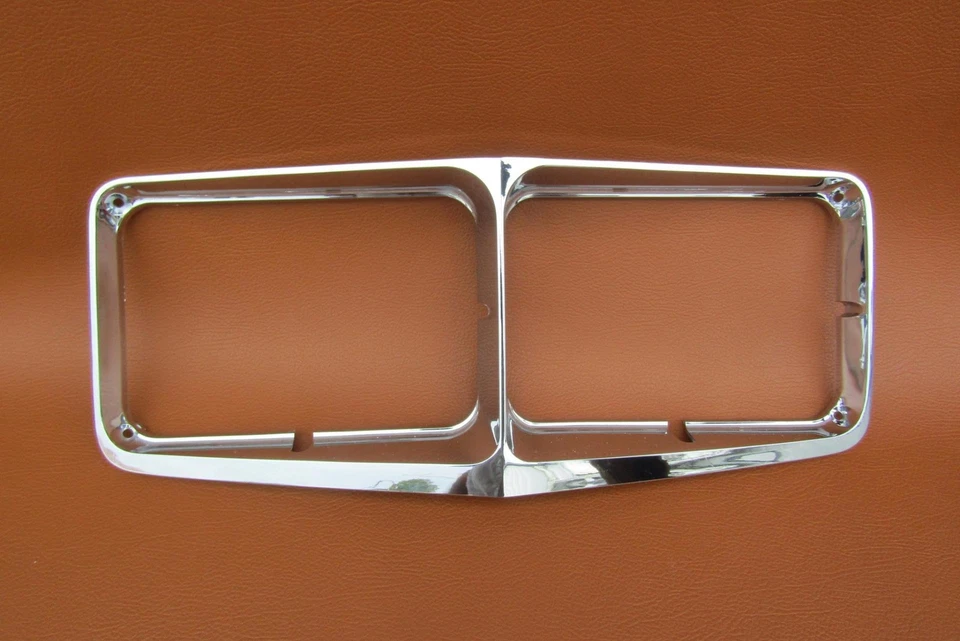 Oldsmobile Toronado 1975-1976 NOS GM RH bisel de faros de pasajero # 417359 Foto 1 de 4
