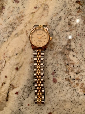 WOMEN'S GOLD FINISH PHILIP PERSIO FASHION DRESS UP OR CASUAL WATCH - Image 1 of 4