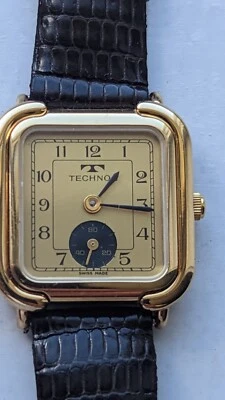 VINTAGE TECHNOS SWISS MADE QUARTZ STAINLESS STEEL SHATTERPROOF WATCH  - Image 1 of 4