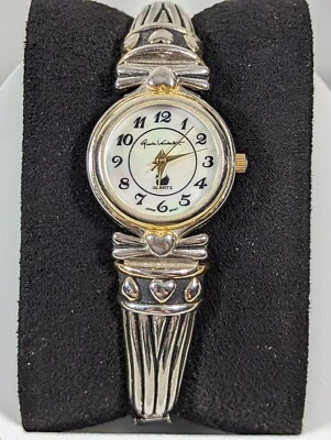 Reloj Gloria Vanderbilt esfera perlada redondo tono plata caja acero inoxidable elástico Foto 1 de 4