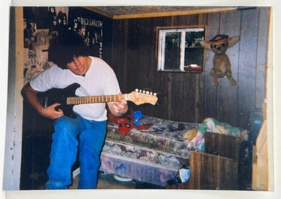 2000s Teen Boy with Electric Guitar in Bedroom Aerosmith Poster Snapshot Photo - Image 1 of 4