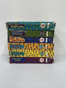 There Goes A VHS Lot of 6 Live Action Bulldozer Race Car Fire Truck Helicopter - Bild 1 von 14