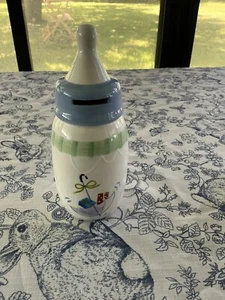 VINTAGE WHITE & BLUE CERAMIC BABY BOTTLE PIGGY BANK - Picture 1 of 6