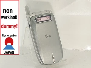 【Factice !】 KYOCERA A1012K (couleur argent) au-japon téléphone portable qui ne fonctionne pas - Photo 1 sur 3
