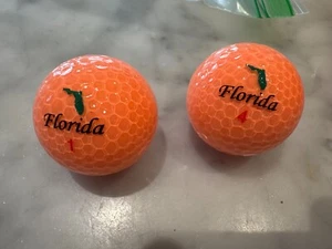 New unboxed Florida logo Orange salmon pink Crystal FL 2 Golf Balls lot 1, 4 - Picture 1 of 3