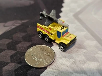 Micro Machines 6×6 Missle Truck Yellow w/ Red Stripe - Image 1 of 4