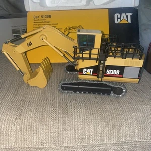 Nr.391/1 Bagger Modellauto Raupenbagger CAT 5130B NZG 1.50 neuwertig Modellcode 3 - Bild 1 von 13